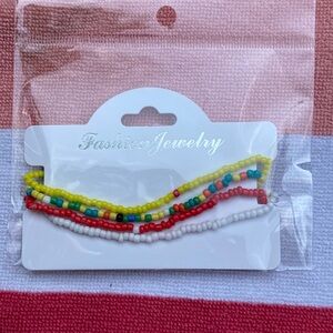 Set of 4 Stretchy anklets.  NWT.. handmade.